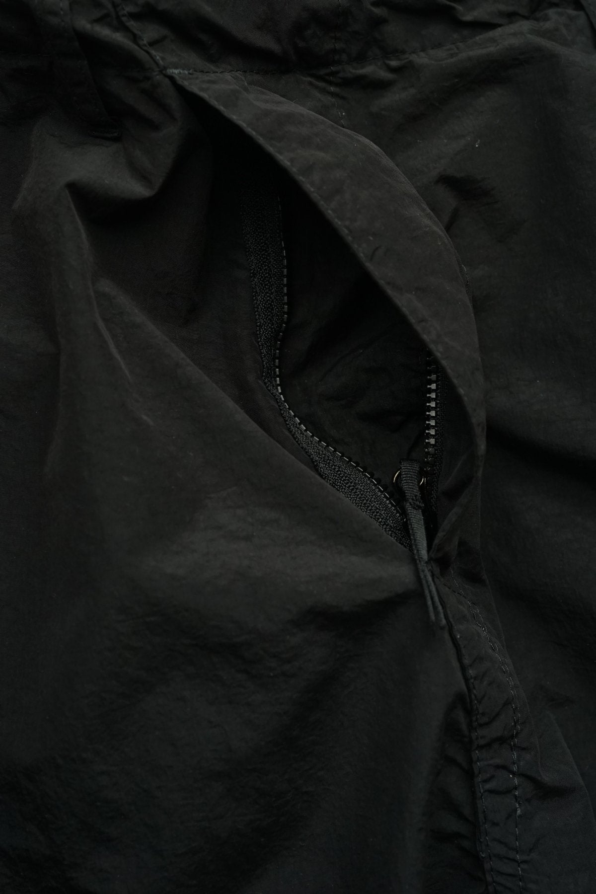 C.P. COMPANY - FLATT NYLON OVERSIZED PANTS - BLACK