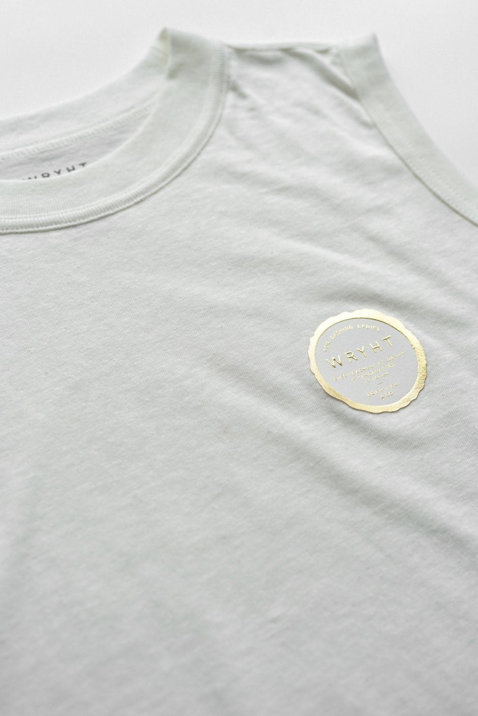 WRYHT - SLEEVELESS TEE - BONE